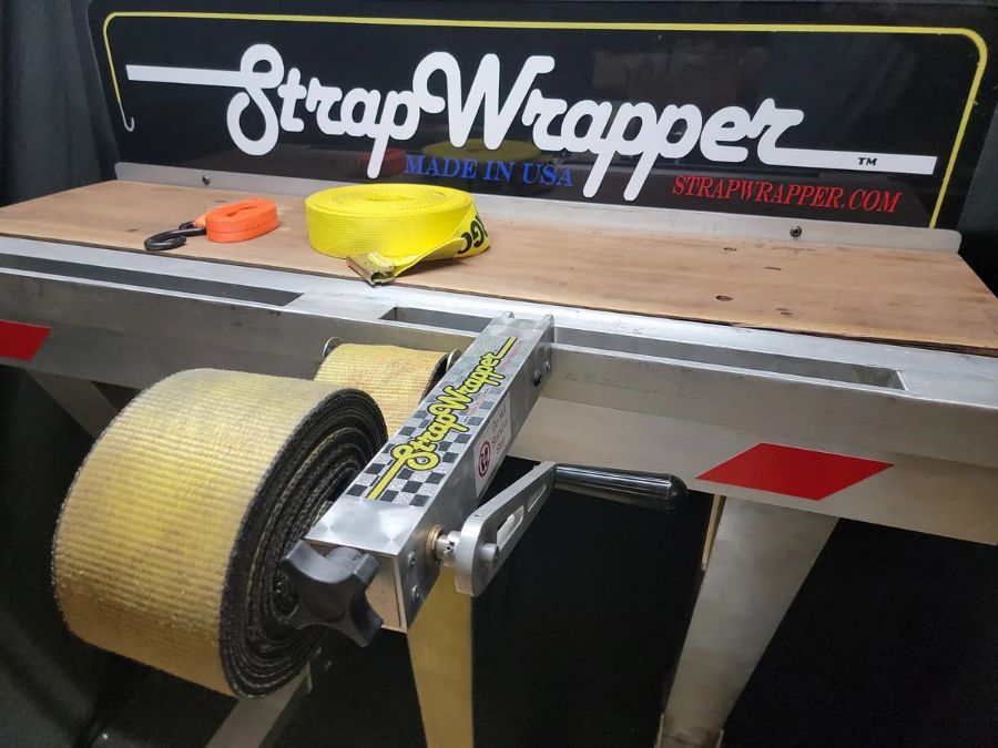 StrapWrapper 4 inch model, aluminum body with black crank handle, shown from above